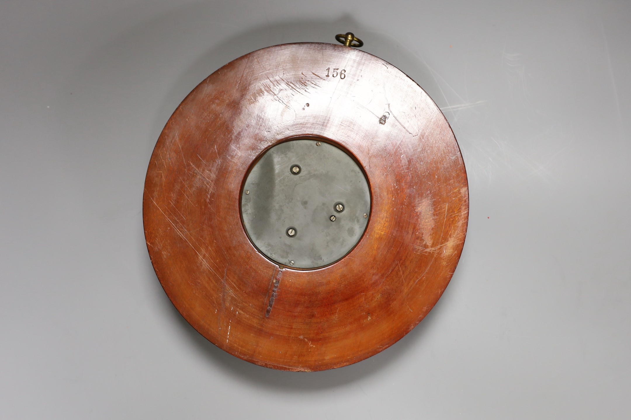 A Victorian aneroid barometer with mother-of-pearl inlaid decoration, 27cm diameter